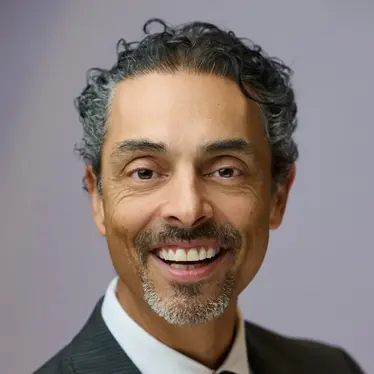 Dr Julian De Silva